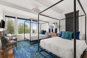 This large bedroom features two queen beds, very large walk in closet, connected to a fabulous bathroom. While we love this view, there are blackout shades to make sure you can sleep in.