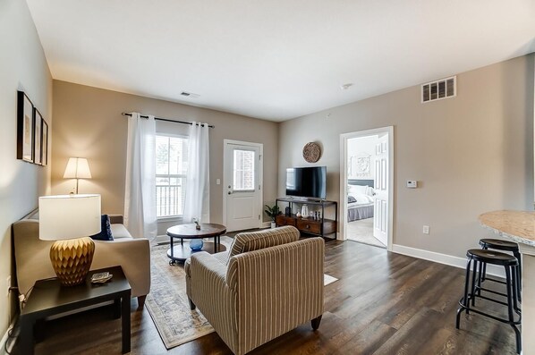 Another view of the living room and patio door.