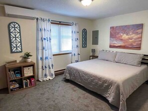King beds in each room with a queen air mattress for the living room