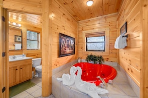 Romantic heart-shaped jacuzzi tub in the master suite.