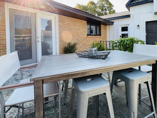 Outdoor Patio Seating with Lake Charlevoix's Peninsula Beach views.