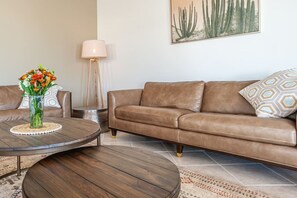 Sink into style—this sleek leather sofa is the perfect blend of comfort and elegance.