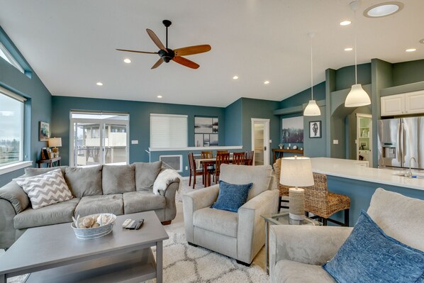 Open plan living/dining space with ample natural light