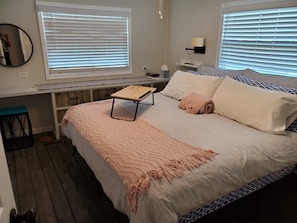 Master bedroom with king size bed.