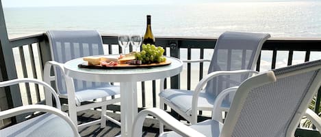 Enjoy our balcony with chairs high enough to allow unobstructed views of the ocean