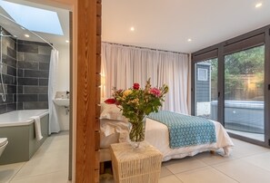 Ground floor: The bathroom is adjacent to the open-plan living area