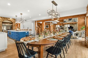 Chef's kitchen with 12 foot table + island seats 20+