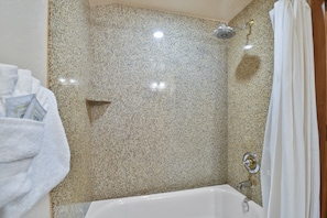 Guest bathroom with shower bathtub combo
