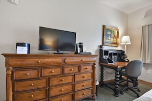 Guest bedroom flat screen TV with designated work space