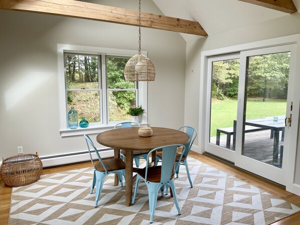 Sunfilled breakfast nook in the kitchen, adjoins the back deck.