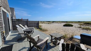 Relax and unwind on the lovely deck with bay views