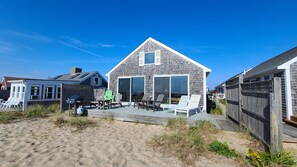 Relax and unwind on the lovely deck with bay views