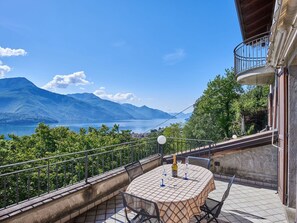 Sky, Cloud, Mountain, Water, Azure, Table, Fence, Outdoor Furniture, Leisure, Tree