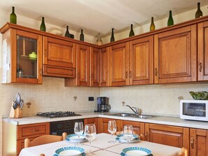 Countertop, Cabinetry, Property, Furniture, Sink, Blue, Kitchen Appliance, Kitchen, Wood, Tap