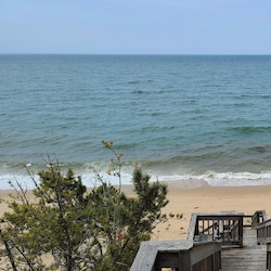 Private stairs lead down to the beach below