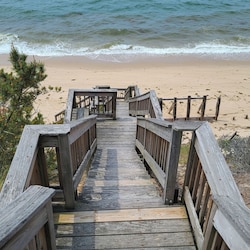 Private stairs lead down to the beach below
