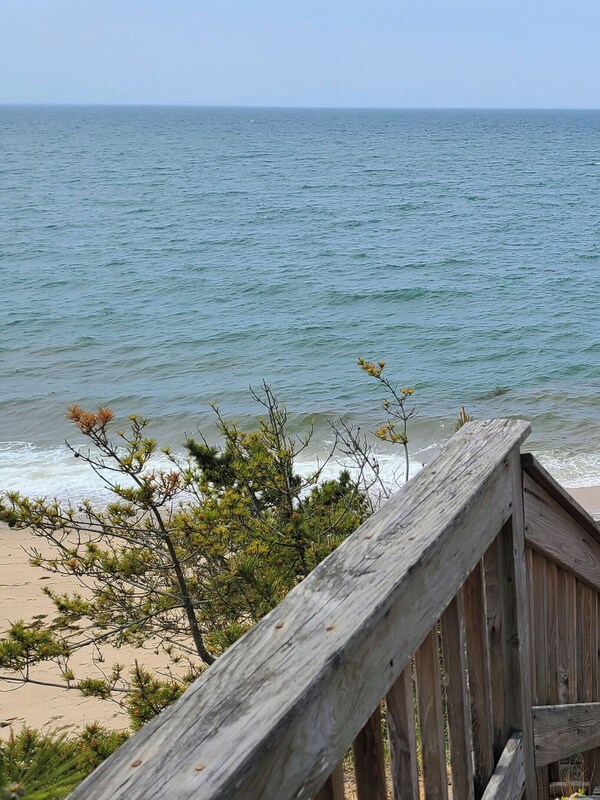 Private stairs lead down to the beach below