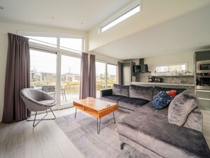 Couch, Furniture, Table, Comfort, Interior Design, Plant, Living Room, Flooring, Wood, Building