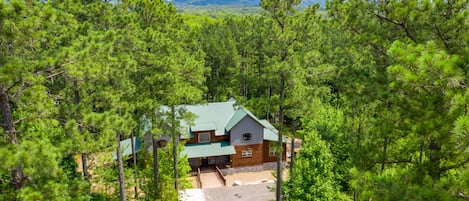 Stay Among the Pines in this luxury cabin that sleeps 20!