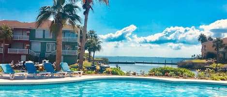 Pet Friendly Harbor Pool with the view of the bay and the Queen Isabella Causeway