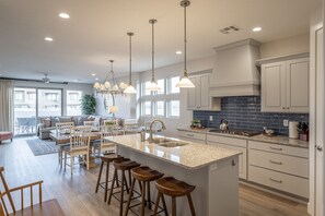 Kitchen Island - The Kitchen Island comfortably seats 4 adults and creates a great space for serving and preparing meals.