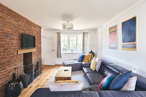 The living room with fire place at Steward's Cottage, Welsh Borders