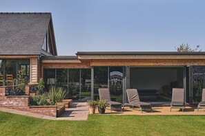 The swimming pool and sun loungers at Big Barn, Welsh Borders