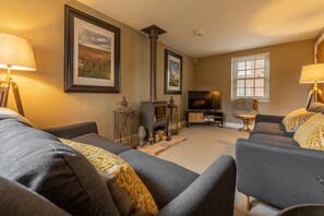 Foxhill House, South Creake: Sitting room with wood burning stove