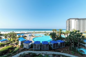 Large private balcony that looks over the lagoon pool, splash pad, and beach!