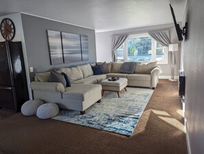Living room - great for a movie night! (Roku TV) Couch has a pull out bed.