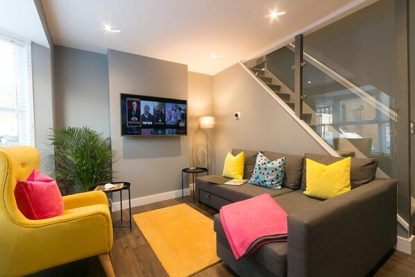 The main Living room consists of a 55 inch Smart TV with Freeview and Netflix.