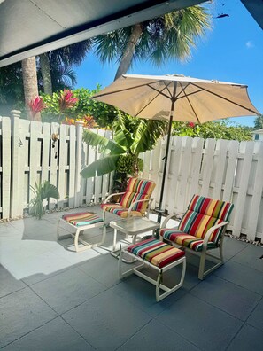 Front patio next to sliding doors and master bedroom