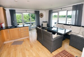 Kitchen/diner with balconies facing onto the harbour