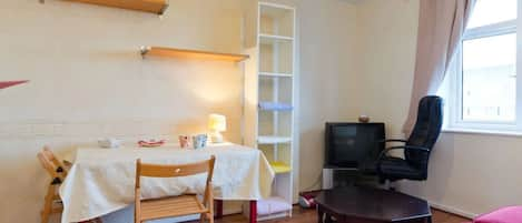 Relax in the living room after a day out, fully equipped with large TV & movies