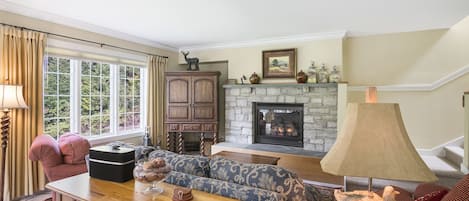 Gas fireplace in living room - TV located in armoire