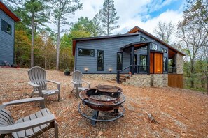 Detached guest suite with 3rd bedroom and bath steps from the main house. Perfect for those wanting extra privacy!