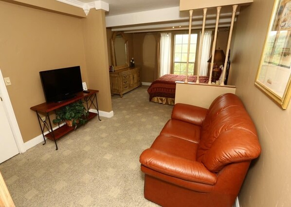 Master Bedroom has a sitting area with cable TV.