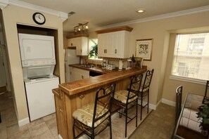 Laundry room in condo with Washer and Dryer.