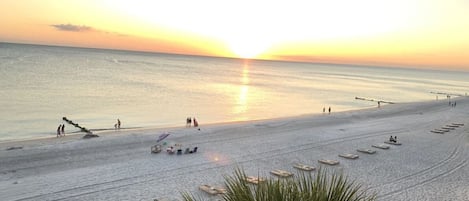 Enjoy sunset from your balcony or the beach.