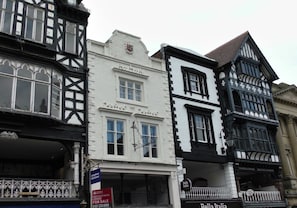 Located in the centre of Chester in a Grade II listed building on the Rows