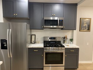kitchen with upgraded stainless steel appliances. 