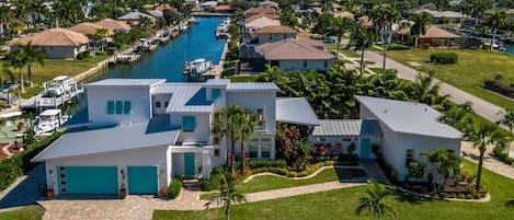 Custom built home with unique details, waterfront views, and two distinct living spaces - the main house and Casita (guest house).