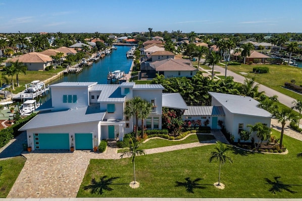 Custom built home with unique details, waterfront views, and two distinct living spaces - the main house and Casita (guest house).