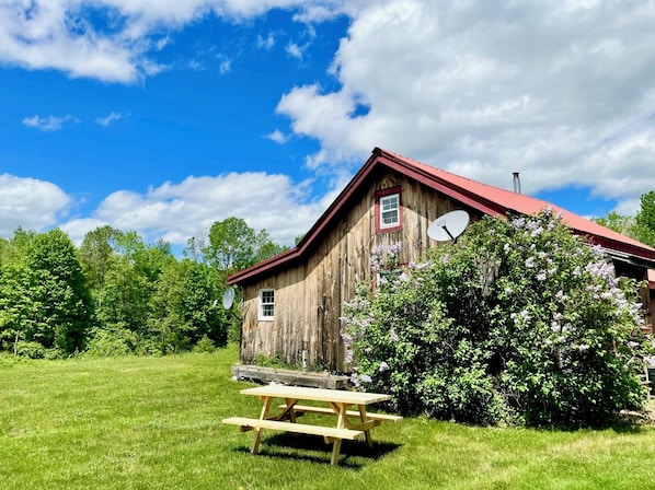 Situated on 13 acres; adjacent to main house that is rented separately.