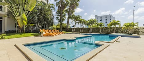 Experience ultimate comfort and luxury in our dreamy pool area. 