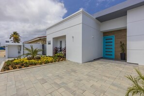 Inviting entrance with a stylish facade, perfect for a relaxing retreat.