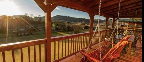 Back Patio with Swing and view of Smoky mountains snd Sunset
