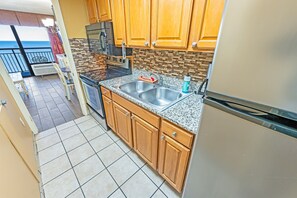 - Fully equipped kitchen with modern appliances, granite countertops, & stylish backsplash - Cook your favorite meals while enjoying breathtaking ocean views just steps away - Functional space with everything you need for a home away from home experience