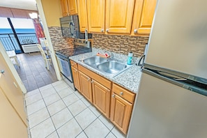 - Fully equipped kitchen with modern appliances, granite countertops, & stylish backsplash - Cook your favorite meals while enjoying breathtaking ocean views just steps away - Functional space with everything you need for a home away from home experience
