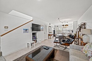 An open floor plan provides plenty of room to gather the whole family together.